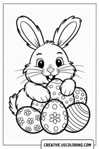 cute-bunny-holding-colorful-decorated-eggs-coloring-page